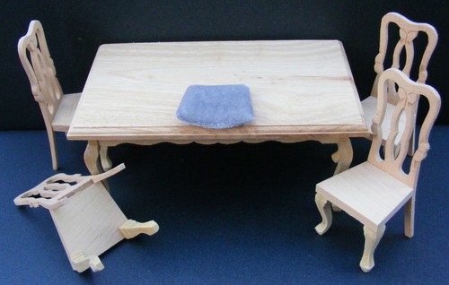 Dolls house table and - dolls,